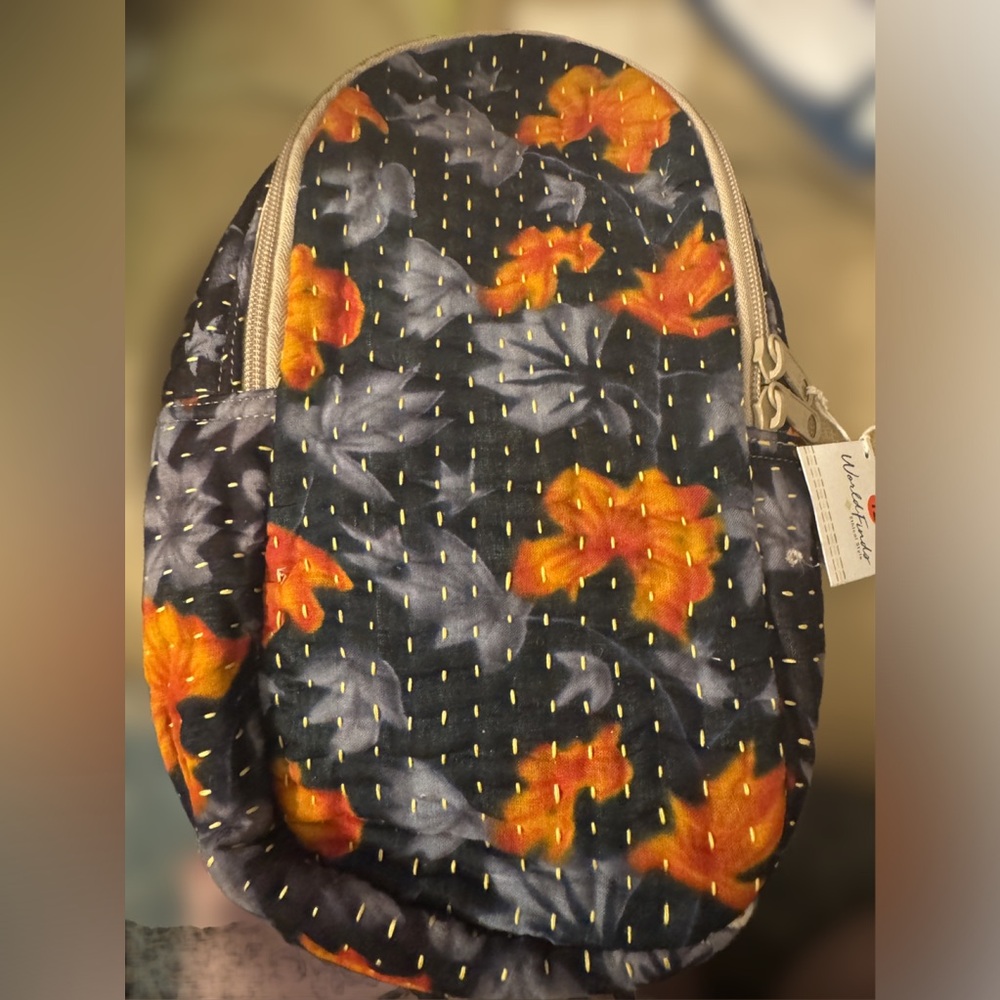 Sling bag with new print. Holds a lot and light weight .
